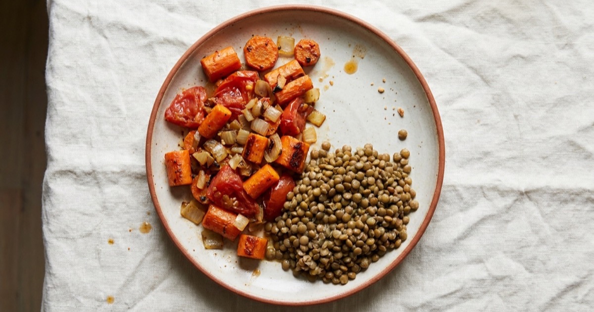 Lentils with carrot and tomato β lentils, carrot, onion, tomato on a plate built around the Harvard Healthy Eating Plate